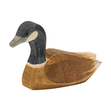 Holztier: Kanadagans schwimmend, ein handgeschnitzter Holzvogel in Dekorationsstil, spiegelt die Eleganz und Detailtreue wider, die KLICKKLACK-Produkte durch nachhaltiges Design und regionale Handwerkskunst charakterisieren.