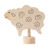 Steckfigur: Stehendes Schaf aus handbemaltem Lindenholz, zeigt ein stilisiertes Schaf mit Spiralmustern als Wolle. Perfekt zur Dekoration von Festtagstischen und kombinierbar mit weiteren Figuren, hergestellt in Deutschland.