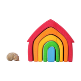 Freies Spielen: Buntes Haus, ein aus hochwertigem Lindenholz gefertigtes, regenbogenförmiges Spielzeug mit fünf Stapel- und Bauelementen, abgebildet mit einem detaillierten Schneckenmotiv, ideal für kreatives Spielen.