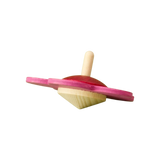 Blumenkreisel aus hochwertigem Buchenholz, liebevoll in Blumenform gestaltet, mit pink-rotem Ring. Perfekt für Kinder ab 3 Jahren, hergestellt in einem deutschen Familienbetrieb, reflektiert KLICKKLACKs nachhaltige, ästhetische Werte.