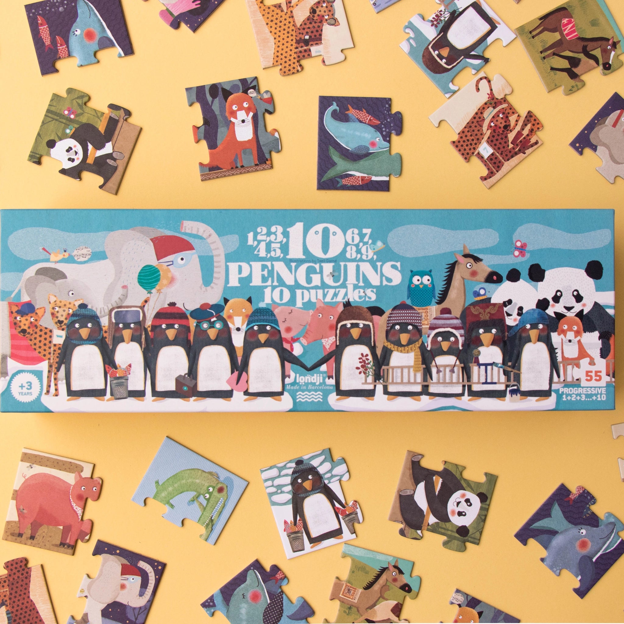 Puzzle: 10 Penguins, ein Set aus 10 progressiven Puzzles mit Tiermotiven, darunter Pinguine, Delfine und Füchse, aus FSC-Papier für spielerisches Lernen und nachhaltige Produktion, geeignet ab 3 Jahren.