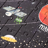 Puzzle: Entdecke die Planeten - 200-teiliges Puzzle mit Raumschiff und Aliens, leuchtet im Dunkeln. Perfekt für Weltraumfans ab 6 Jahren, aus FSC-Papier und recyceltem Karton, spanische Handarbeit.