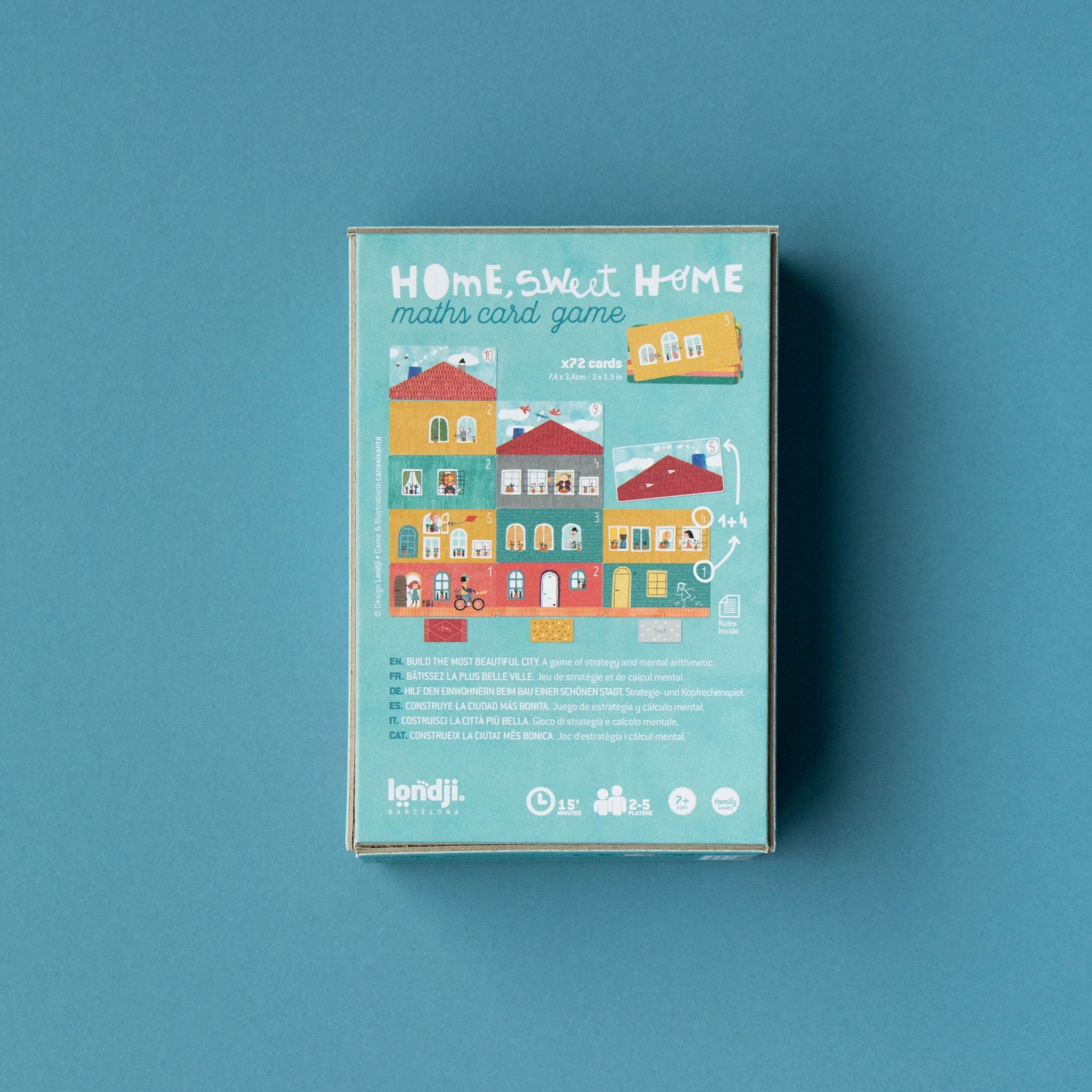 Lernspiel: Home Sweet Home, ein Kartenspiel in einer Box aus FSC-Papier und recyceltem Karton, zeigt ein buntes Gebäude. Fördert strategisches Denken für Kinder ab 7 Jahren, hergestellt in Spanien.