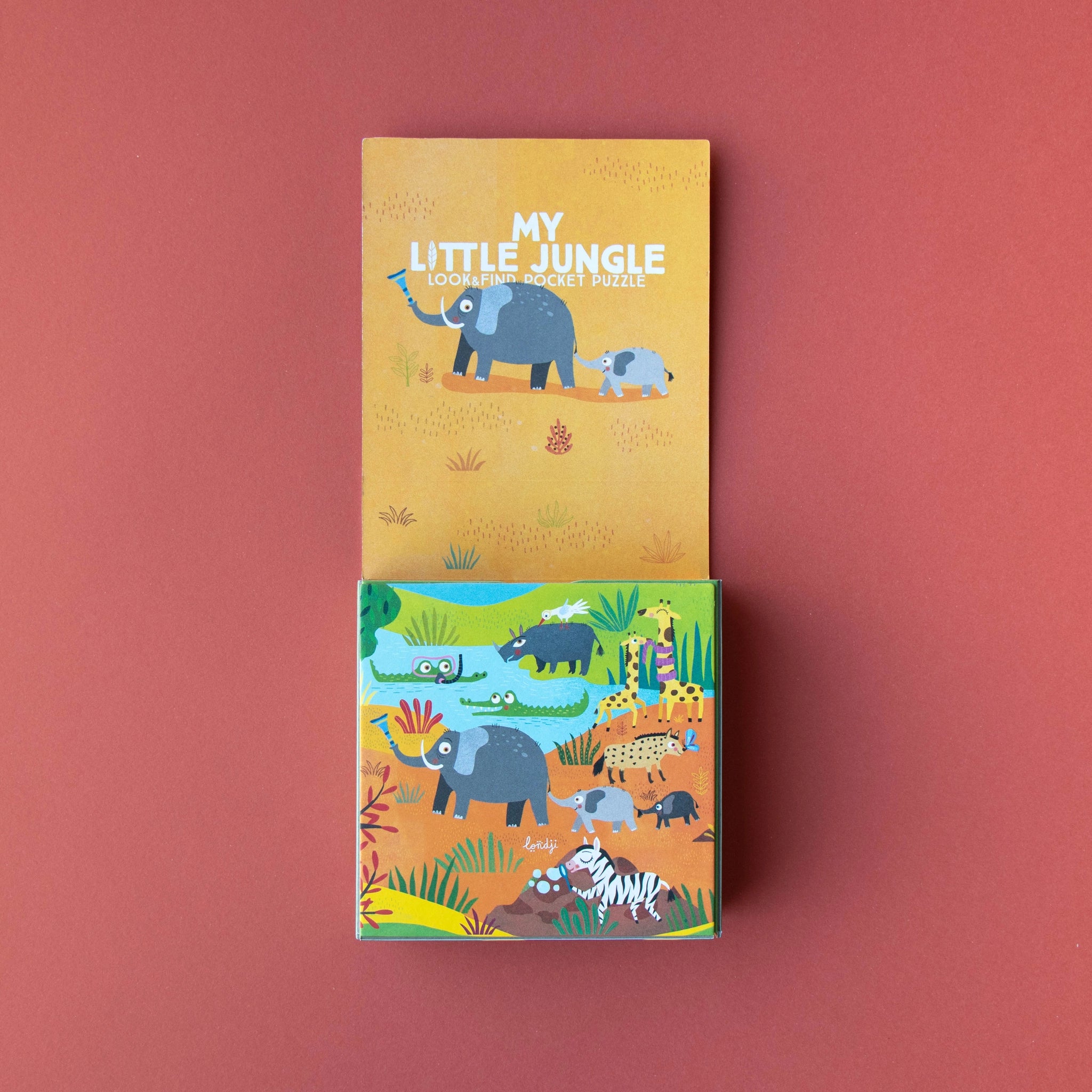 Taschenpuzzle: My little jungle zeigt ein buntes Cartoon-Dschungelmotiv mit Elefanten und Nashörnern, ideal für Kinder ab 3 Jahren. Nachhaltig aus FSC-Papier und recyceltem Karton gefertigt, perfekt für unterwegs.