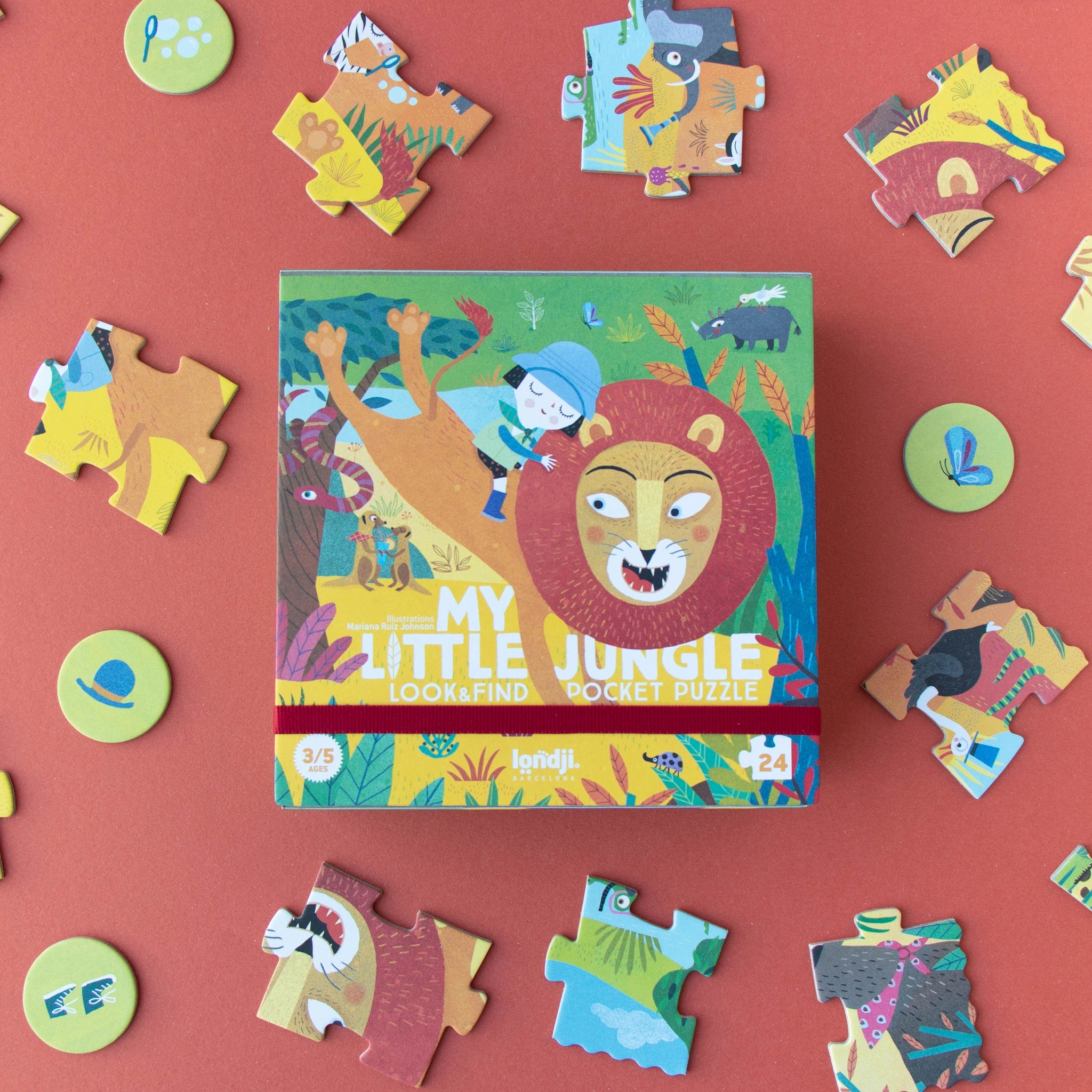 Taschenpuzzle: My little jungle, 24-teilig, zeigt einen Cartoon-Löwen und ein Mädchen. Ideal für Kinder ab 3 Jahren, aus nachhaltigen Materialien gefertigt. Enthält 16 Suchkarten für ein interaktives Spiel.