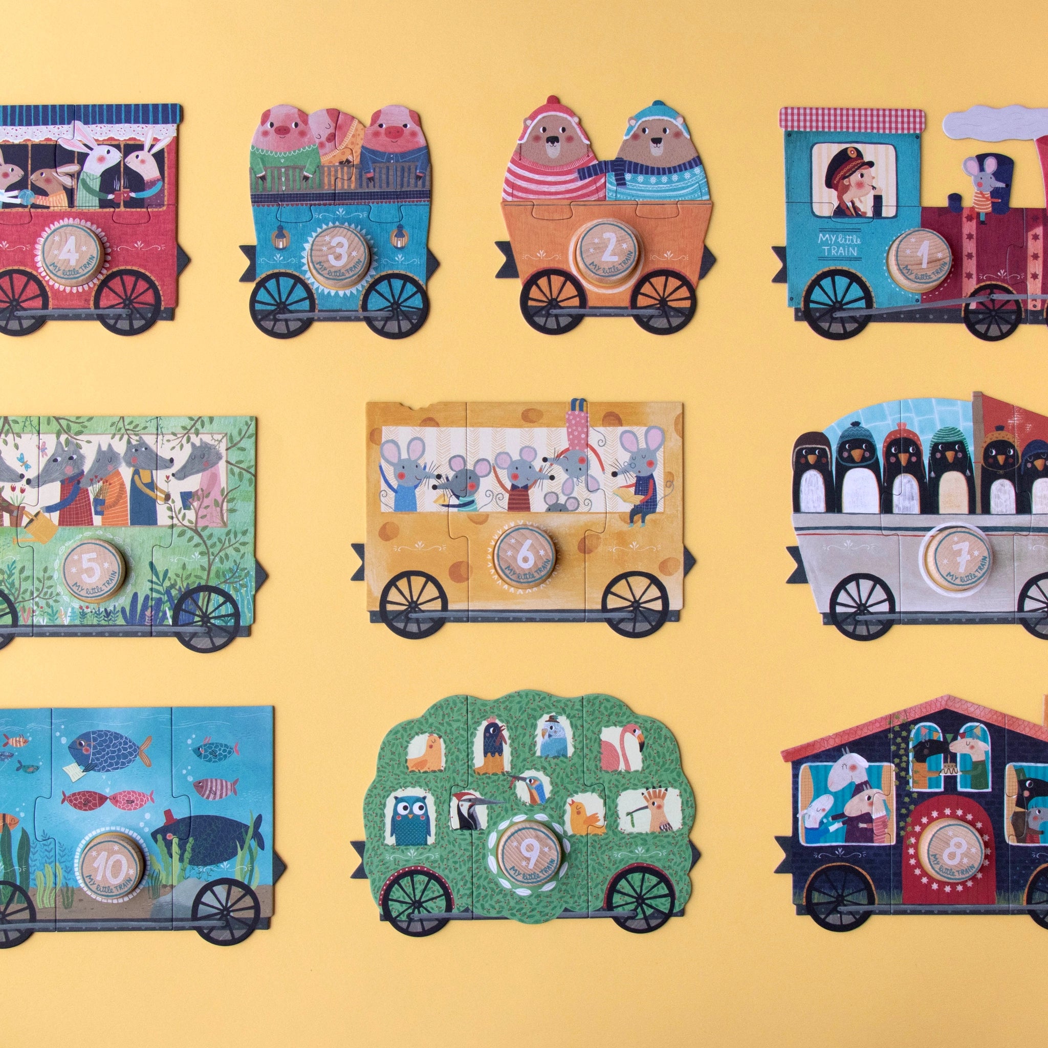 Puzzle: My little train – Ein Set aus zehn dreiteiligen Puzzles, die bunte Zugwaggons mit Cartoon-Tieren zeigen. Ideal zum spielerischen Lernen von Zahlen für Kinder ab 2 Jahren. Nachhaltig in Spanien gefertigt.