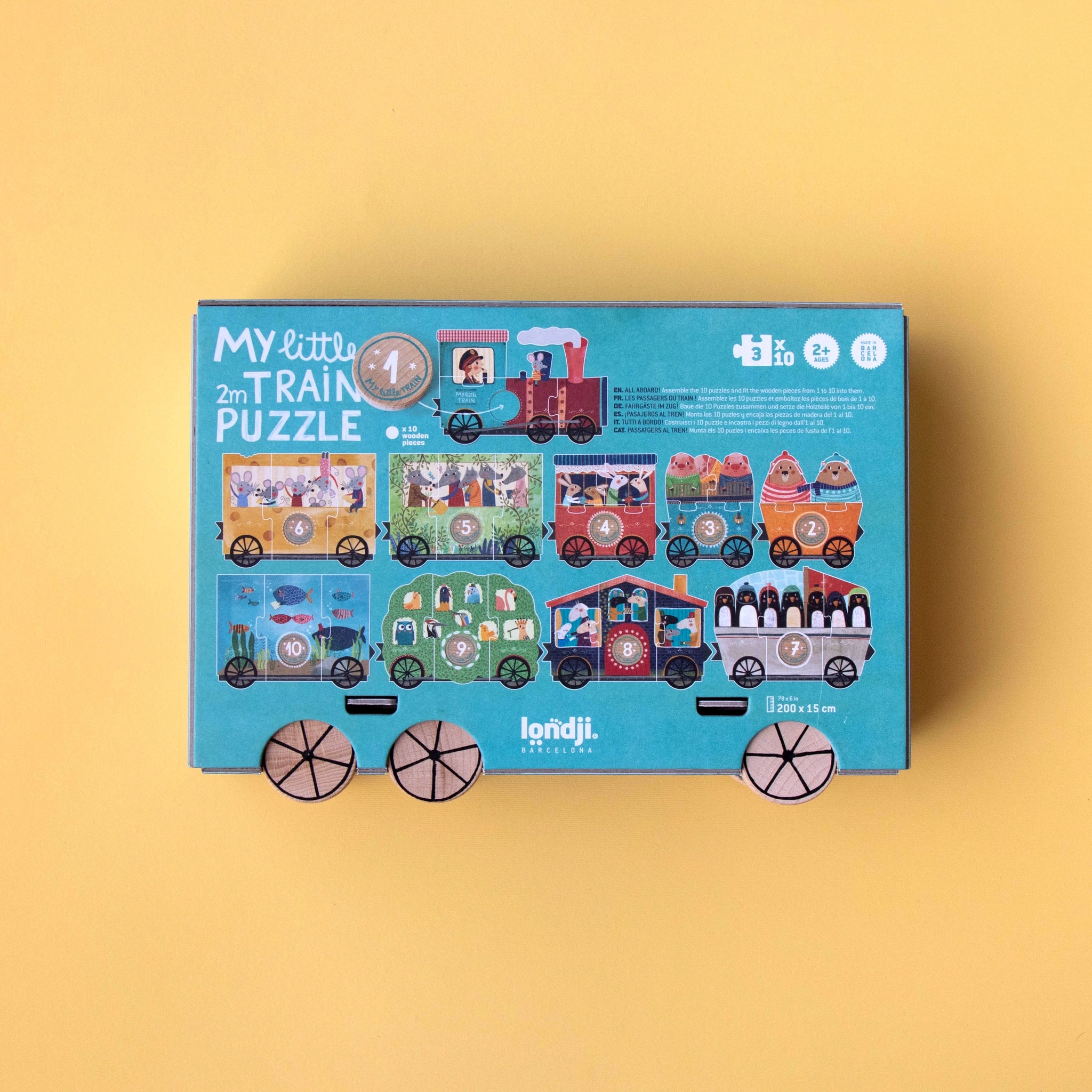 Puzzle: My little train - Eine Schachtel mit cartoonartigen Zugwaggons-Puzzles aus FSC-Papier und recyceltem Karton, ideal zum spielerischen Erlernen der Zahlen 1 bis 10 für Kinder ab 2 Jahren.