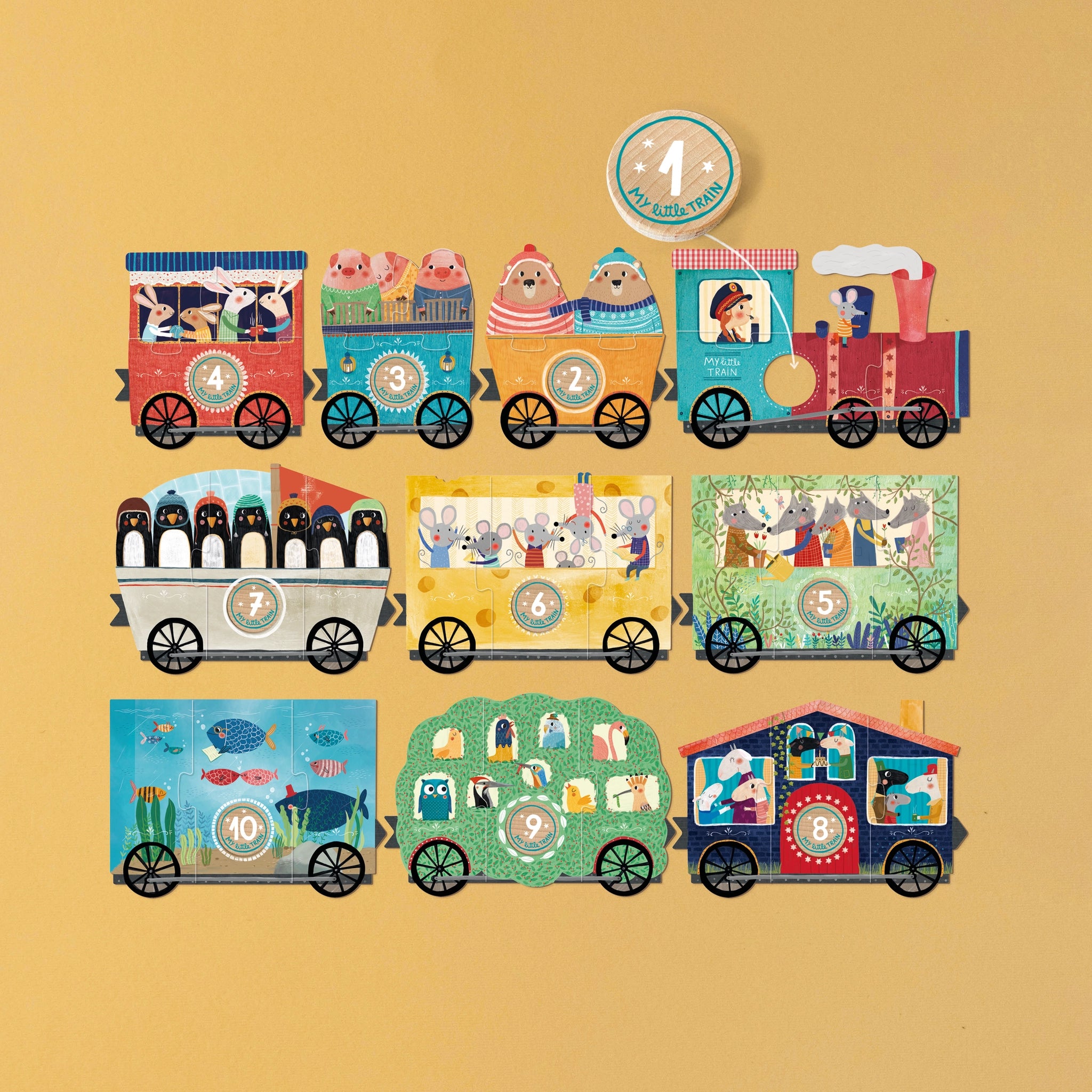 Puzzle: My little train, bestehend aus 10 dreiteiligen Zugwaggon-Puzzles aus FSC-Papier und recyceltem Karton, fördert spielerisch das Zahlenlernen für Kinder ab 2 Jahren. Hergestellt in einer spanischen Manufaktur.