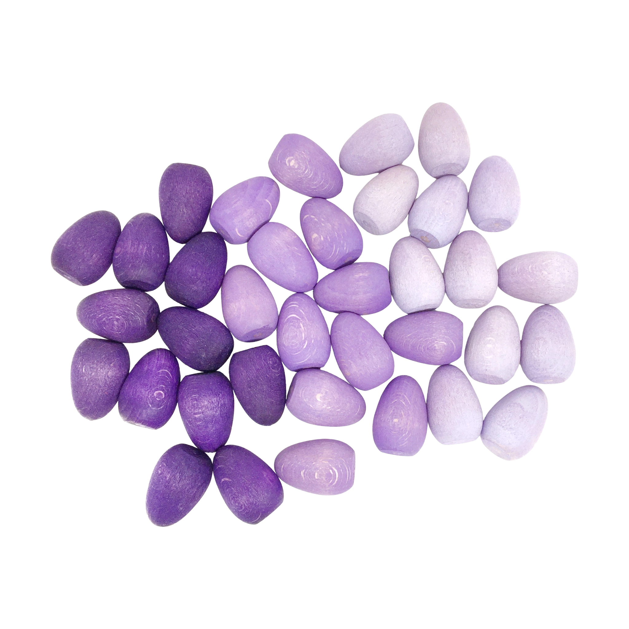 Freies Spiel: Mandala Egg – Nahaufnahme eines handgefertigten lilafarbenen Holz-Eies. Teil eines Sets nachhaltiger Spielzeuge zur kreativen Gestaltung von Mandalas, ideal für freies Spielen.