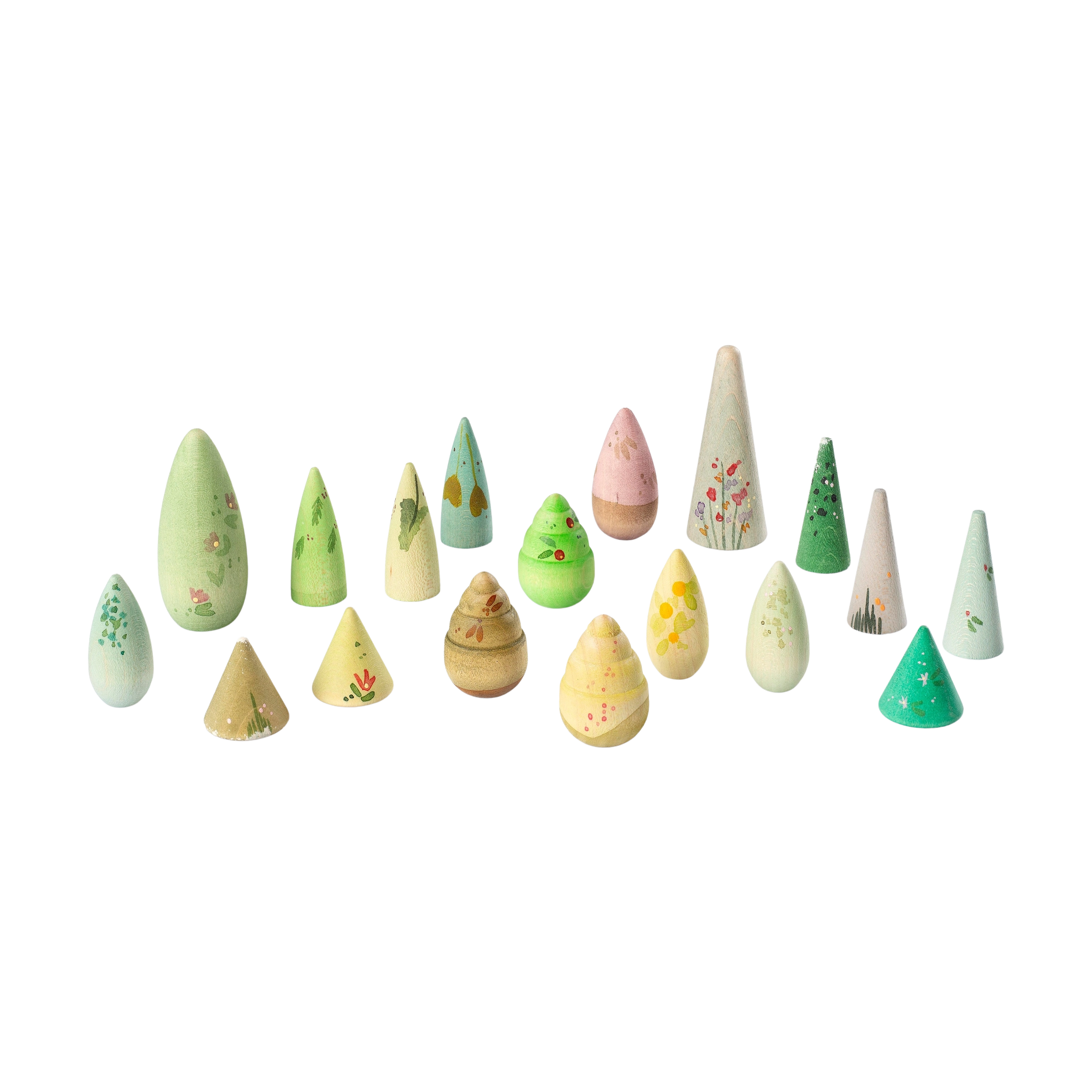Freies Spiel: Forest Tree, kleine konische Objekte in sanften Pastelltönen, verziert mit floralen Mustern, erinnern an kreative Badebomben. Nachhaltig produziert, verkörpern sie KLICKKLACKs ästhetischen und modernen Designanspruch.