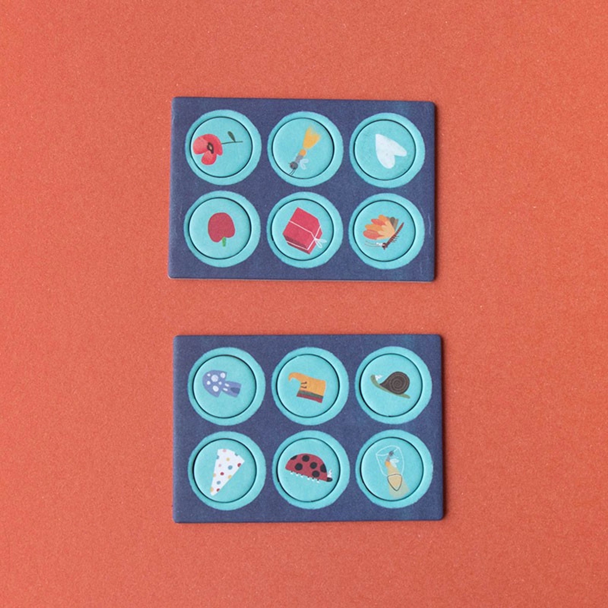 Minipuzzle: Unicorn zeigt zwei Bildlotto-Tableaus mit je sechs runden Fliesen, die verschiedene Motive wie Blumen, Tiere und Alltagsgegenstände darstellen. Nachhaltig produziert aus FSC-Papier in Spanien, ideal für Kinder ab 4 Jahren.