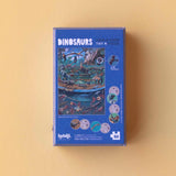 Minipuzzle: Dinosaurs zeigt eine prähistorische Szene mit Dinosauriern. Die Schachtel enthält 50 Teile und 12 Lernkarten, ideal für Kinder ab 5 Jahren, aus nachhaltigen Materialien in Spanien gefertigt.