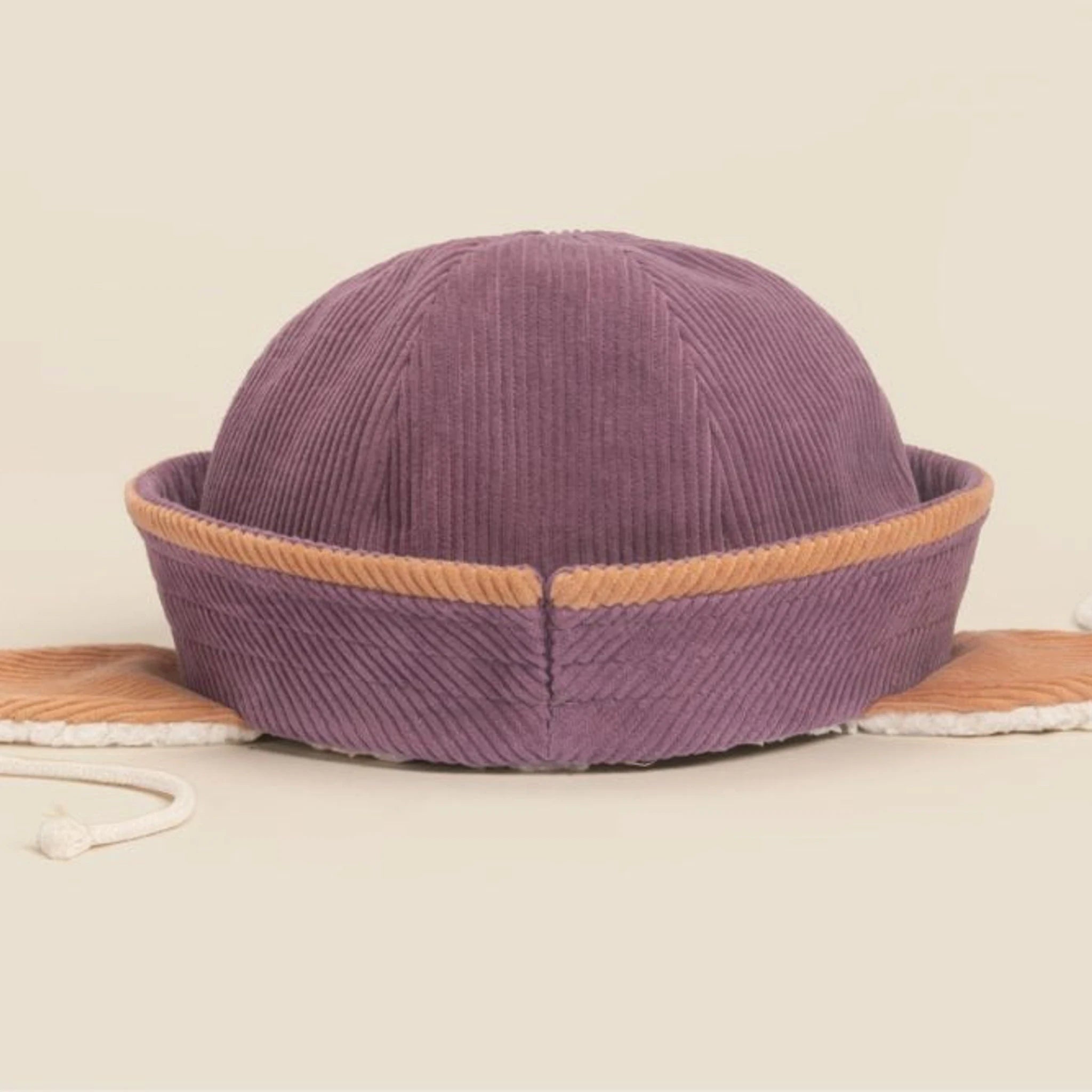 Cord-Wintermütze in Mauve mit weichem Plüschfutter